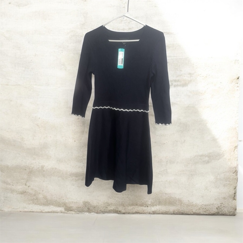 Elegant Black Dress with White Trim